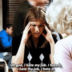 A person holding her head with her handsDescription automatically generated