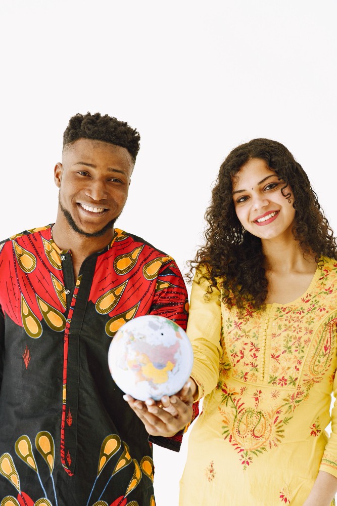 Couple holding a globe