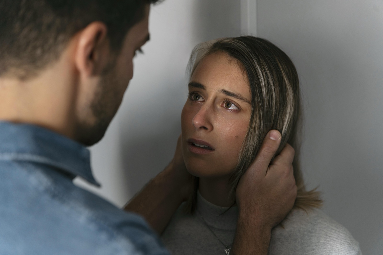 Woman looking away from a partner