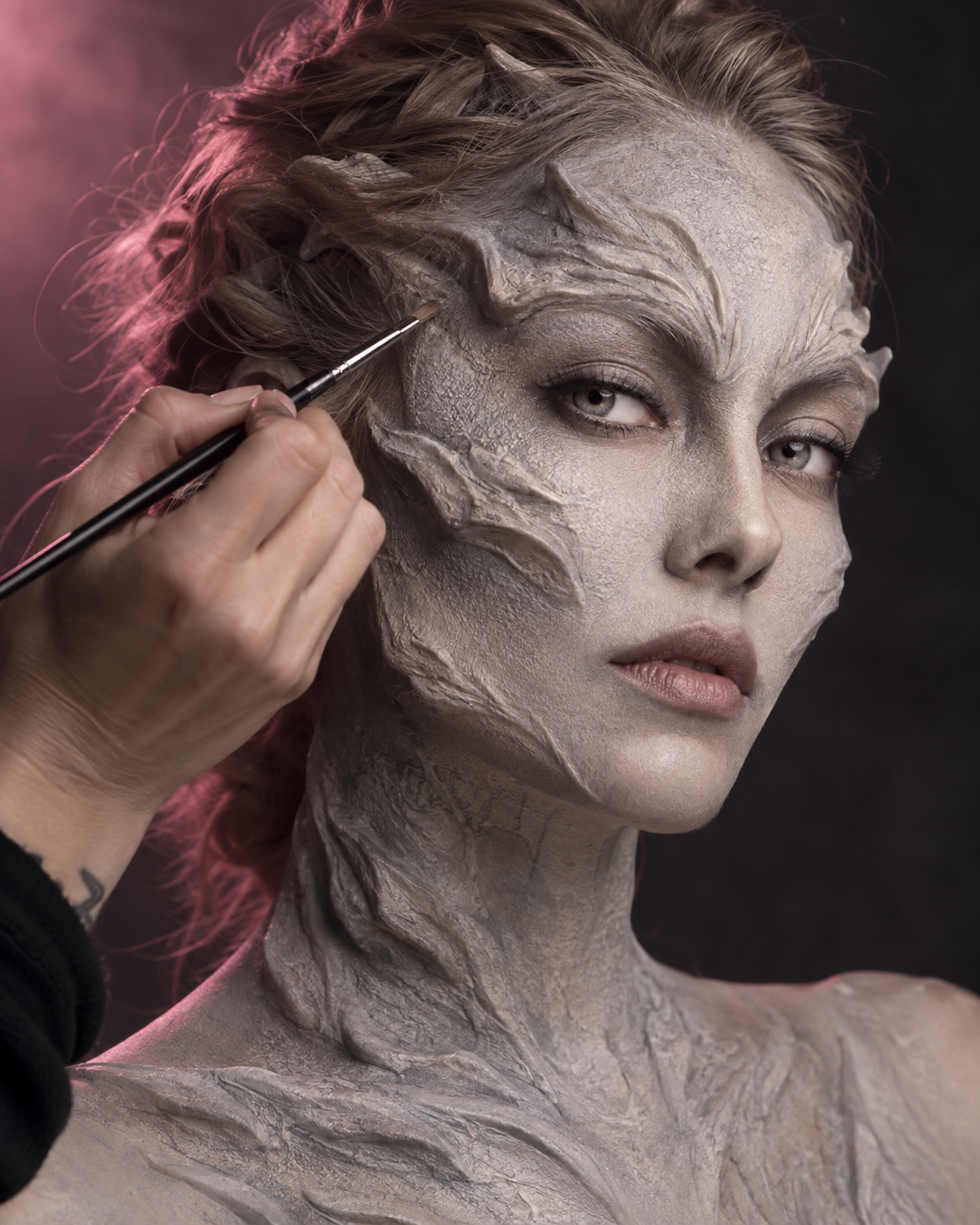 Special FX character makeup being applied with a brush