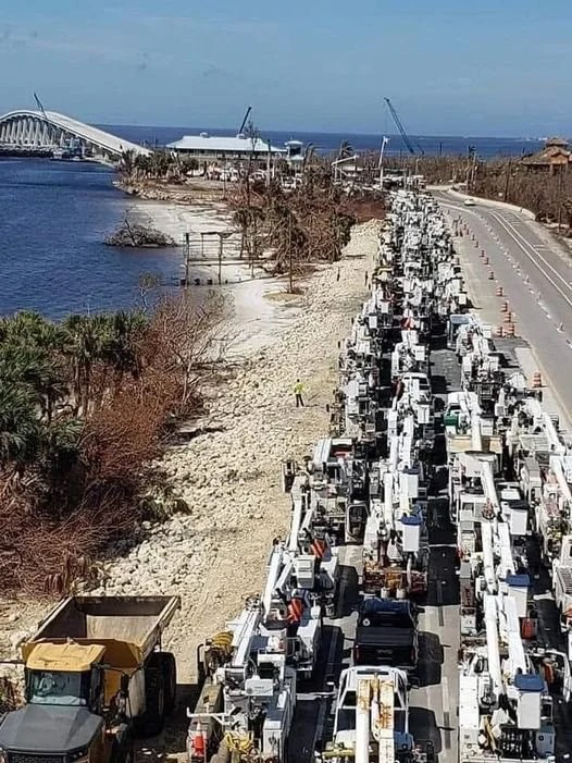 Convoy of bucket trucks on Sanibel causeway