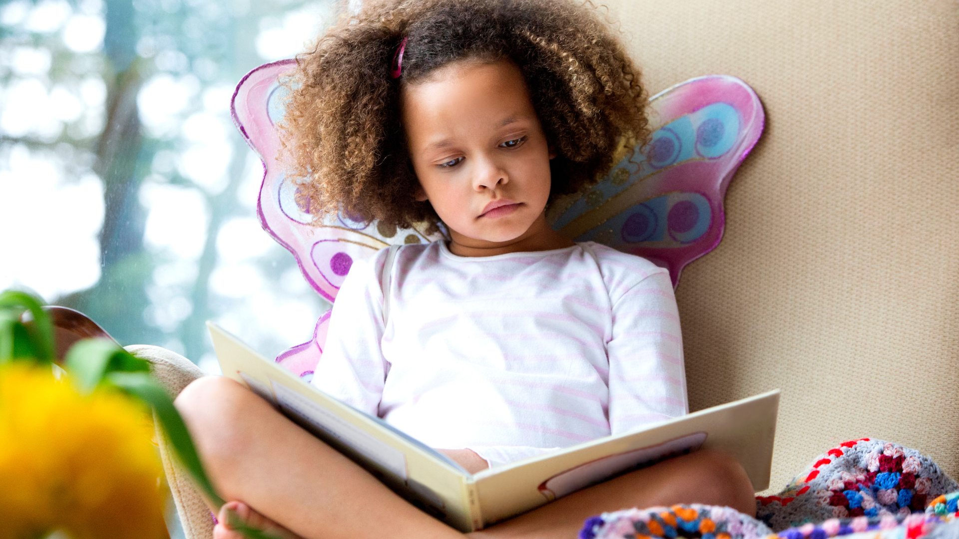 A child enjoying a quiet reading moment