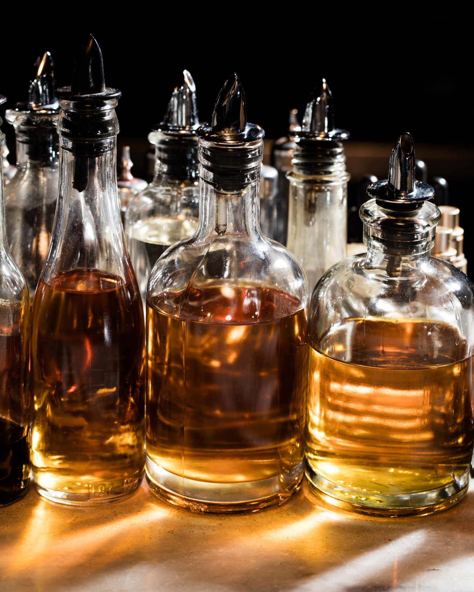 A lineup of bottles for a compact bar
