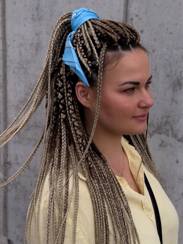 Afro braids down to the mid back in a blonde and brown kanekalon blend, hair by Olga Olikova