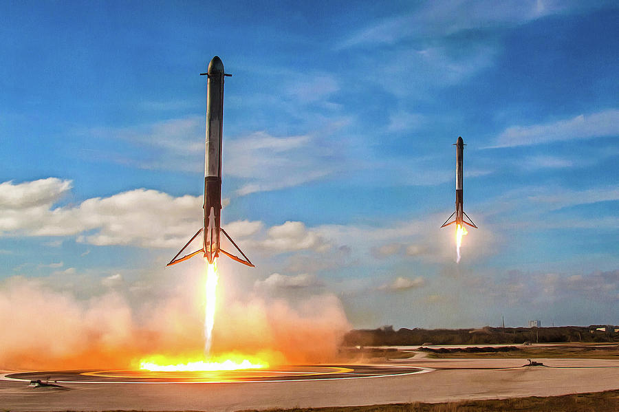 SpaceX Falcon 9 reusable rocket boosters landing simultaneously