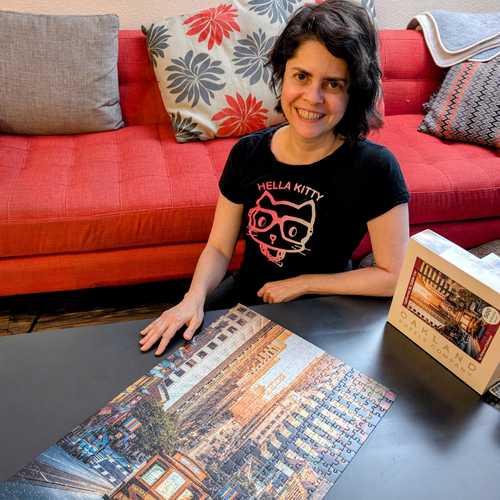 Luciana Lage solving a puzzle