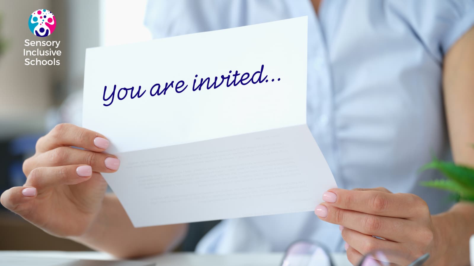 photo of a person opening a letter. On the front it reads "you are invited..."