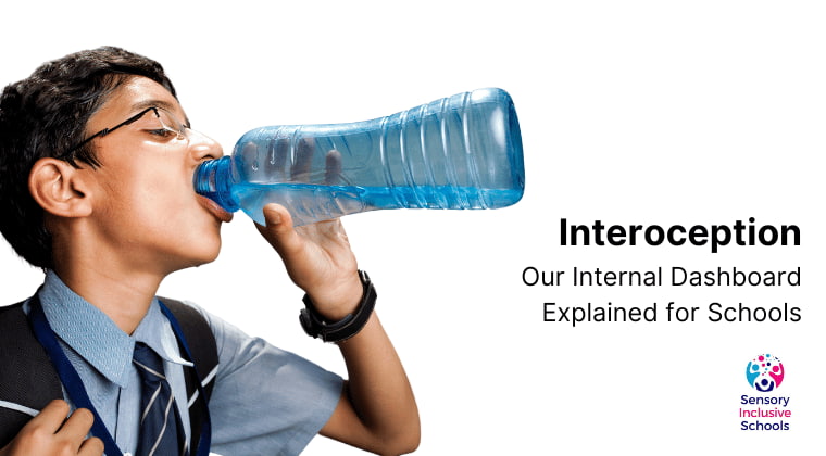 A boy drinks from a bottle of water