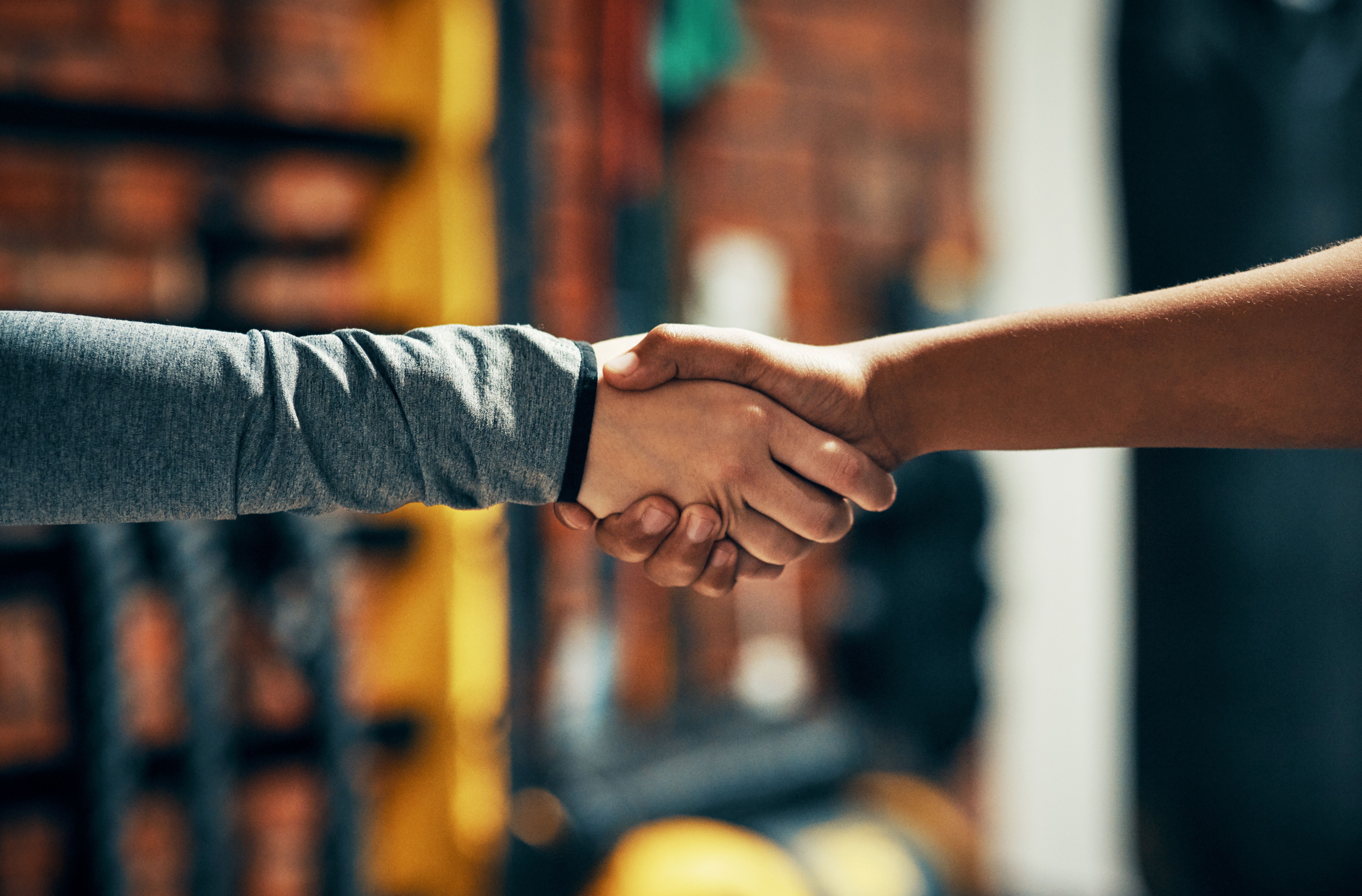 a handshake in a gym