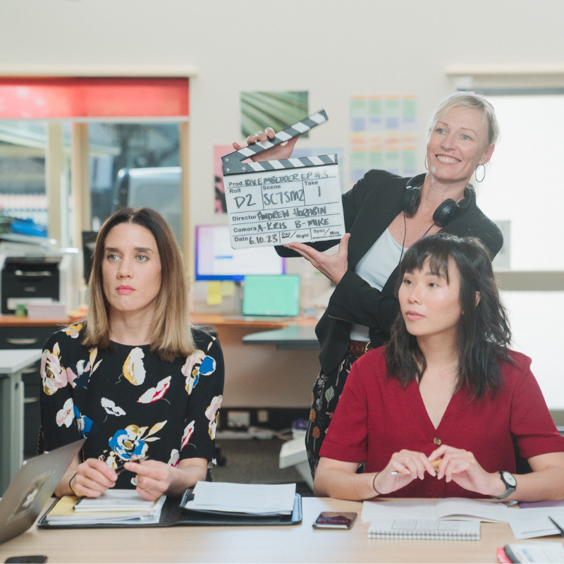 Colleagues laughing over a Bullshift session